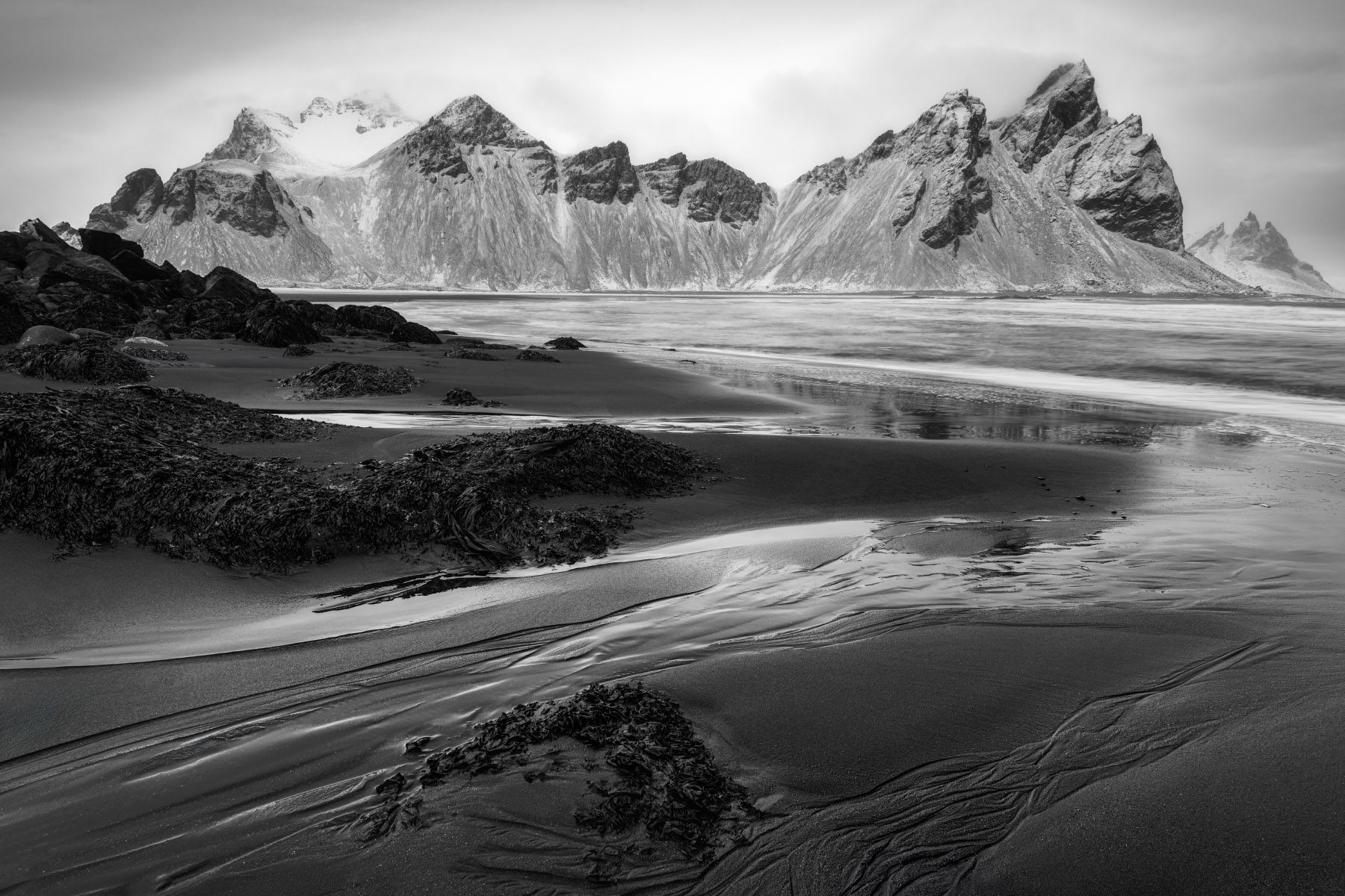 Mount Vestrahorn stands out as a striking presence on the Stokknes Peninsula on the South Coast of Iceland. 
