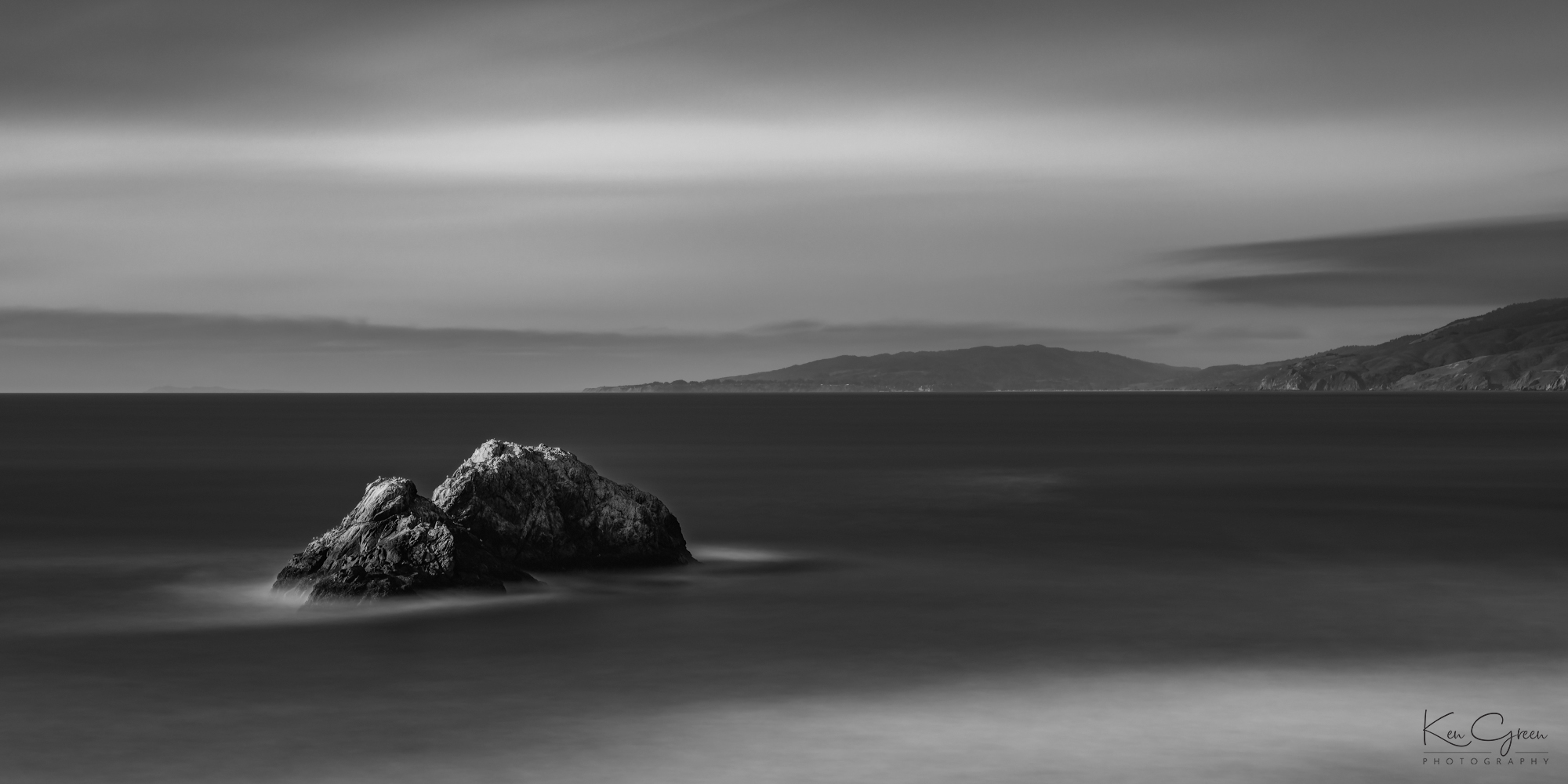 Black and white photo of sea stack off the coast of San Francisco